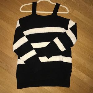 Black and white striped cold shoulder sweater.
